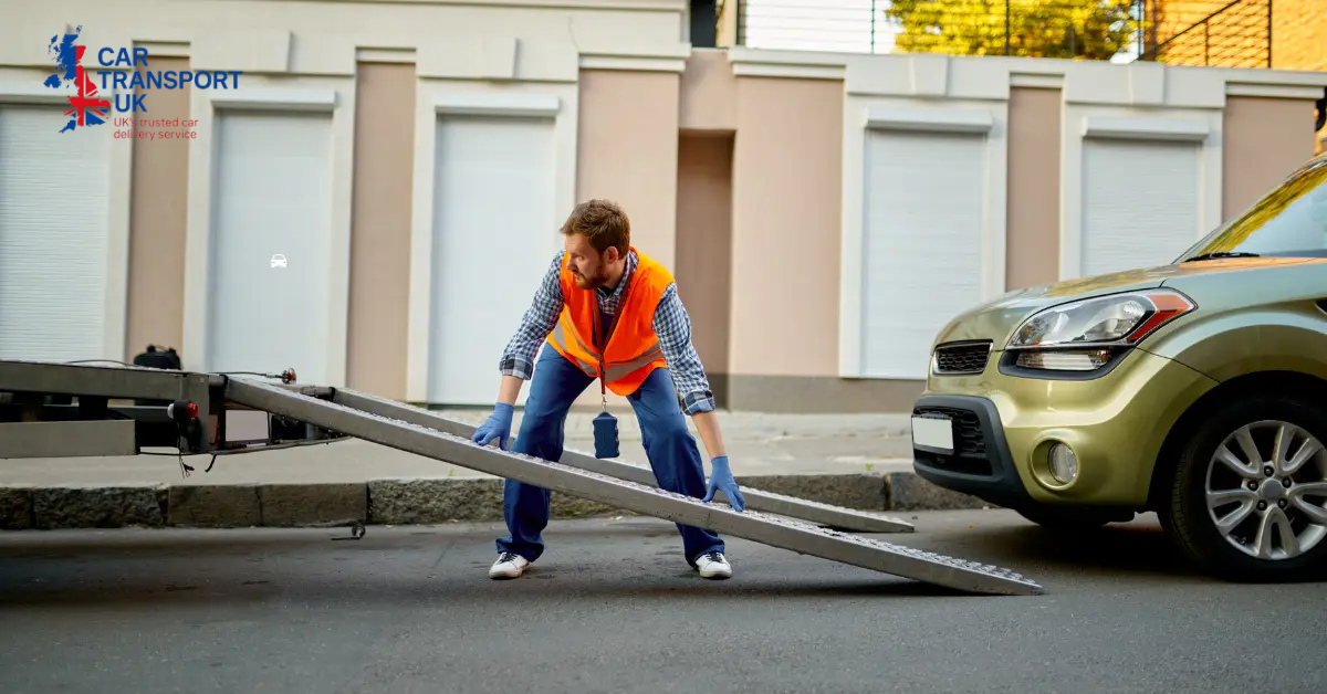 Driver inspecting car before transport for vehicle transport services UK