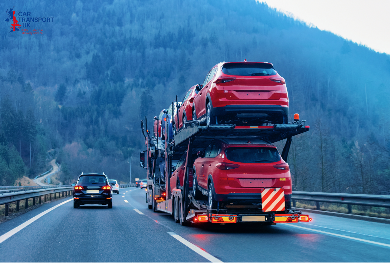 Car transporter truck delivering vehicles on a UK motorway showing typical longdistance car transport.